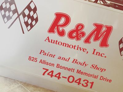 The R&M Automotive, Inc. Paint and Body Shop sign